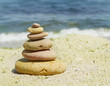 spa stones on sea shore background