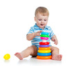 funny baby boy playing with colorful toy isolated on white