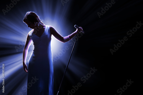 Photo: Female singer on the stage Female singer on the stage