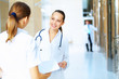 Photo: Portrait of two friendly female doctors Portrait of two friendly female doctors