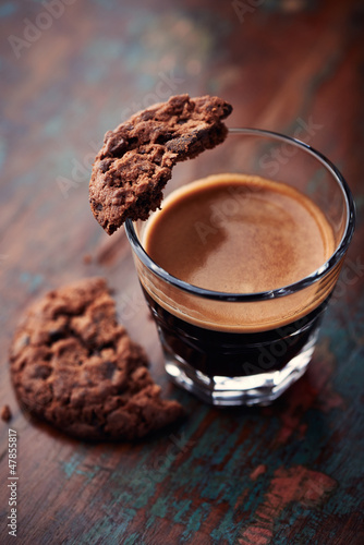 Photo: Glass of espresso and chocolate cookie Glass of espresso and chocolate cookie