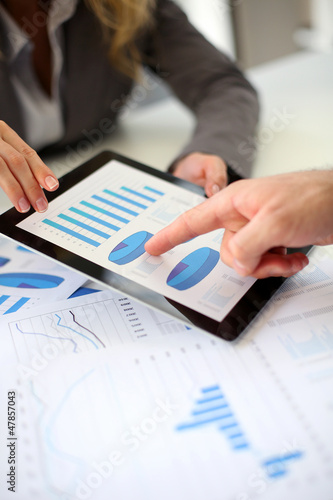 Photo: Business plan presentation on digital tablet Business plan presentation on digital tablet