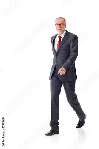Photo: Walking mature business man Walking mature business man
