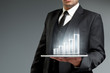 Financial report & statistics. Bar graph on tablet pc.