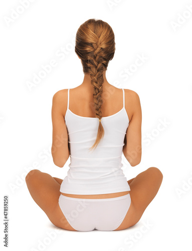 Photo: woman in undrewear practicing yoga lotus pose woman in undrewear practicing yoga lotus pose