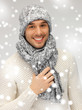 handsome man in warm sweater, hat and scarf