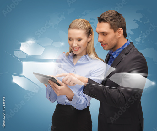 Photo: man and woman with virtual screens man and woman with virtual screens