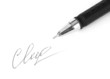 Closeup of signature (fake, not real) and pen, isolated on