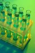 test-tubes with liquid on blue background