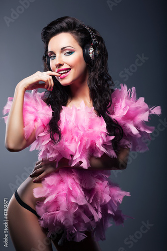 Photo: Sexy Desirable Woman in Pink Feathers Dancing - Nightlife Sexy Desirable Woman in Pink Feathers Dancing - Nightlife