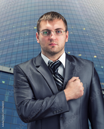 Photo: Businessman with hand over heart Businessman with hand over heart
