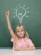 Photo: Girl at the Blackboard with idea Girl at the Blackboard with idea