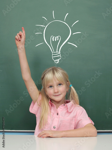 Photo: Girl at the Blackboard with idea Girl at the Blackboard with idea