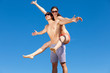 Photo: Happy Young Couple Together On The Beach Happy Young Couple Together On The Beach