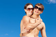 Photo: Happy Young Couple Together On The Beach Happy Young Couple Together On The Beach