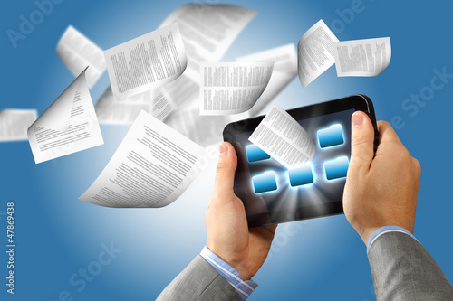 Photo: e book reader and books e book reader and books