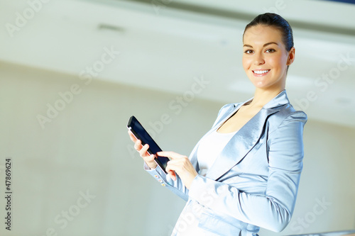Photo: portrait of a confident young businesswoman portrait of a confident young businesswoman