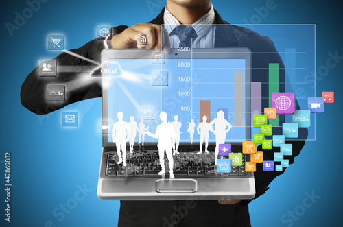 Photo: holding a laptop holding a laptop