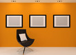 Photo: Gallery wall. Modern armchair and empty picture on the wall in o Gallery wall. Modern armchair and empty picture on the wall in o