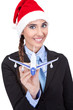 santa businesswoman  holding  plane