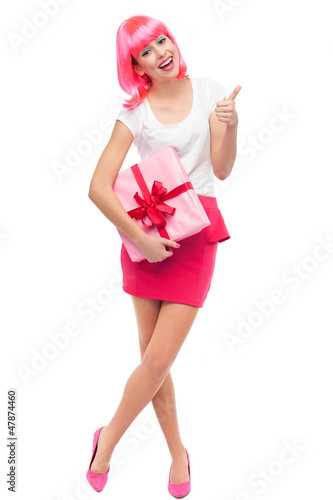 Photo: Attractive woman holding gift Attractive woman holding gift