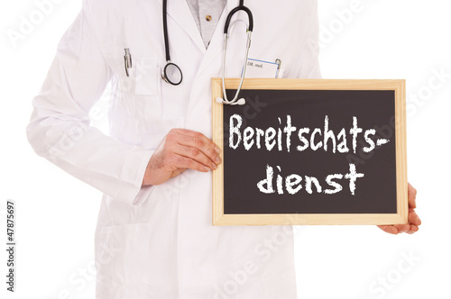 Photo: Arzt mit Schild - Bereitschaftsdienst Arzt mit Schild - Bereitschaftsdienst
