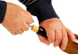 hands open bottle of wine.