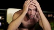 Sad, depressed young man looking to camera, steadicam shot