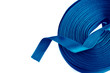 Blue ribbon roll on a white background