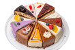 Photo: Twelve different pieces of cake on white Twelve different pieces of cake on white