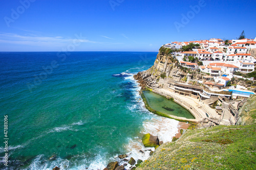 Photo: Azenhas do Mar white village, cliff and ocean, Sintra, Portugal. Azenhas do Mar white village, cliff and ocean, Sintra, Portugal.