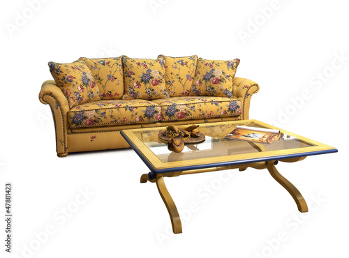Photo: Antique and decrated sofa with coffee table isolated on white Antique and decrated sofa with coffee table isolated on white