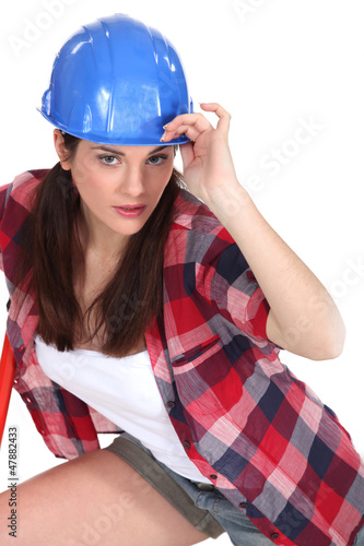 Photo: Woman with blue helmet Woman with blue helmet