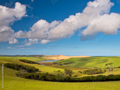 Photo: Green tranquil Valley with Blue Sky Green tranquil Valley with Blue Sky