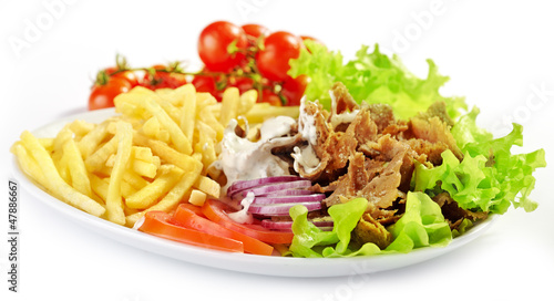 Photo: Plate of kebab and vegetables Plate of kebab and vegetables
