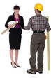 Female architect and male carpenter