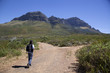 A man walikng up a mountain