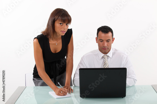 Photo: business duo at work business duo at work