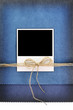 Polaroid photo frame on vintage blue background