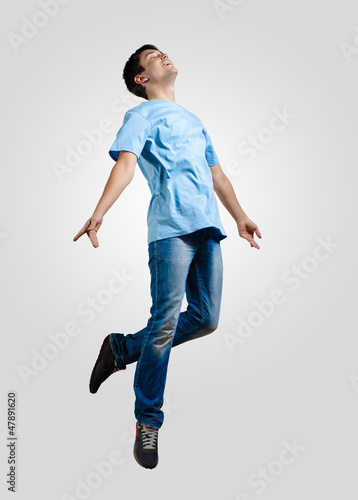 Photo: Young man dancing and jumping Young man dancing and jumping