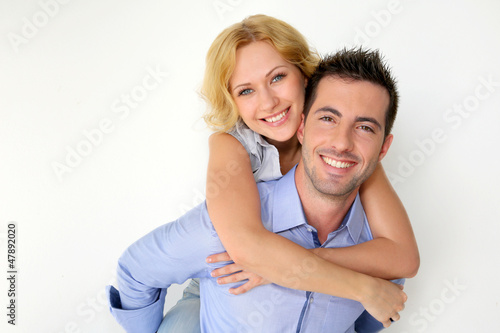 Photo: Man carrying girlfriend on his back Man carrying girlfriend on his back