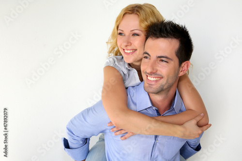 Photo: Man carrying girlfriend on his back Man carrying girlfriend on his back