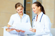 Portrait of two friendly female doctors