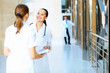 Portrait of two friendly female doctors