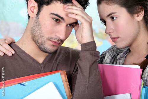 Photo: Student offering support to a stressed friend Student offering support to a stressed friend