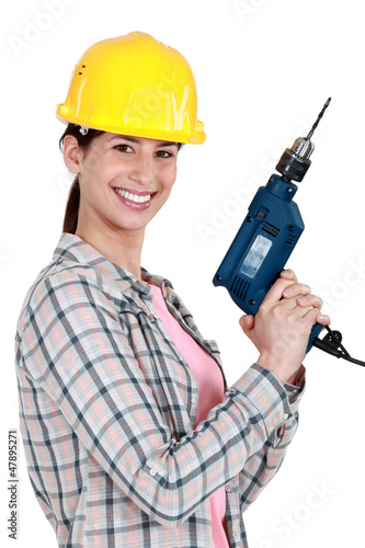 Photo: Woman with a drill Woman with a drill