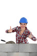 Woman bricklayer