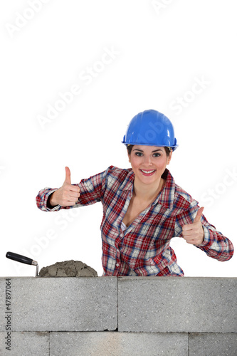 Photo: Woman bricklayer Woman bricklayer