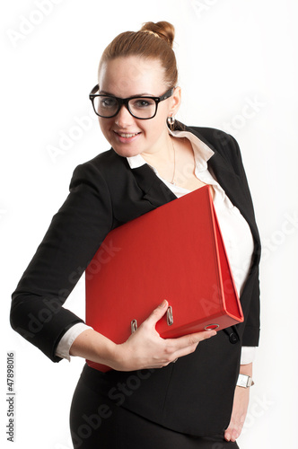 Photo: Business woman with folders on a light background Business woman with folders on a light background