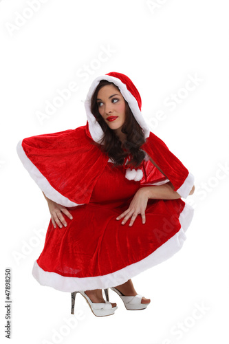 Photo: woman in a Santa Claus suit woman in a Santa Claus suit